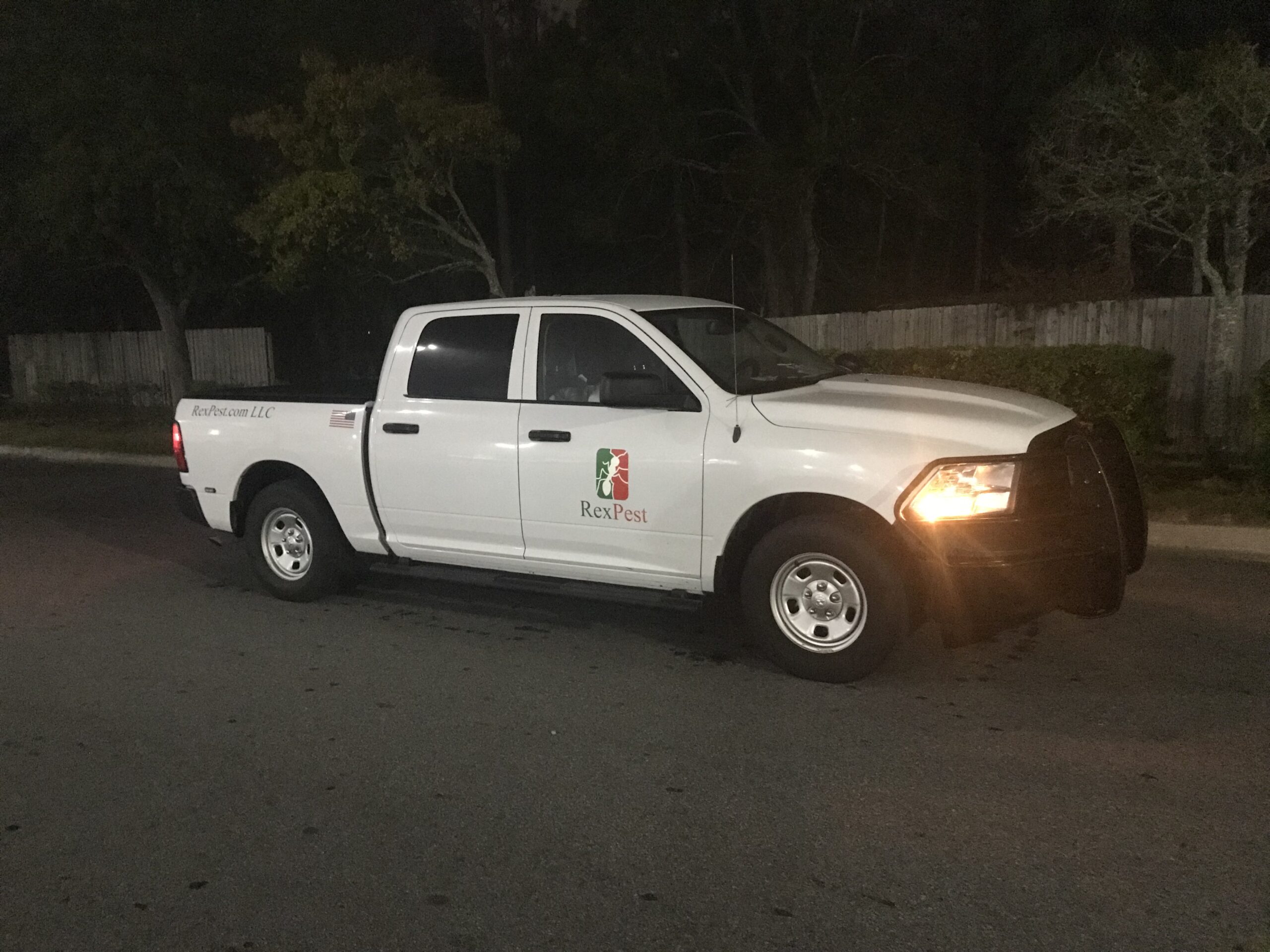RexPest service truck parked at night, ready to handle pest control needs with expert care
